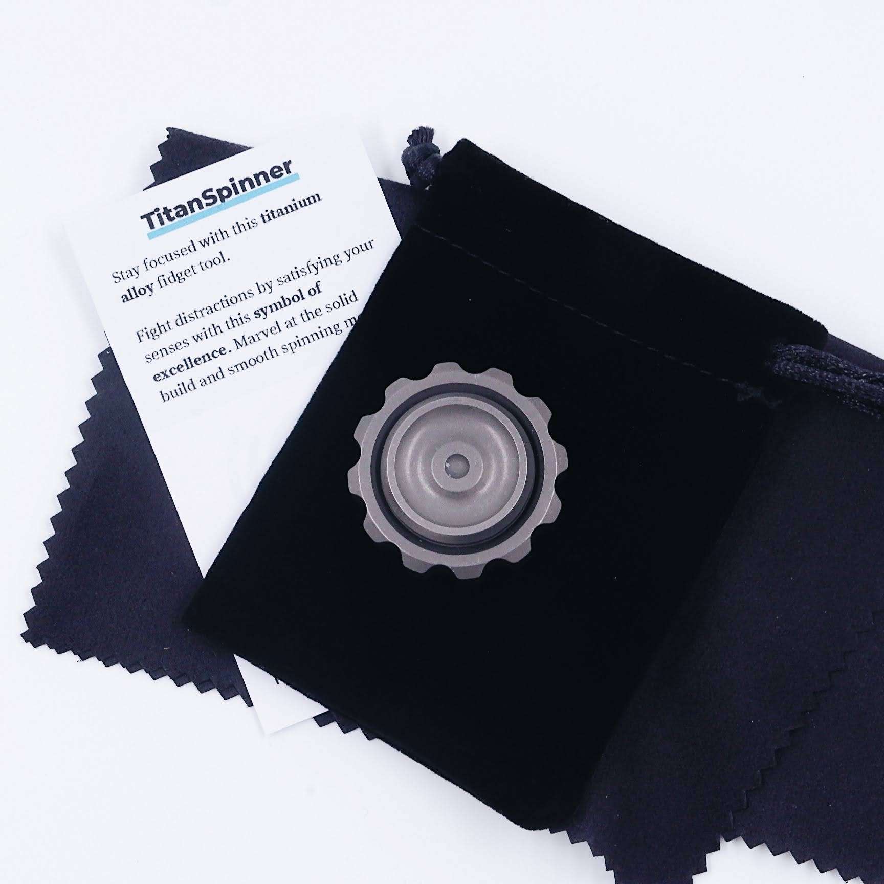 TitanSpinner on carrying pouch and cleaning cloth