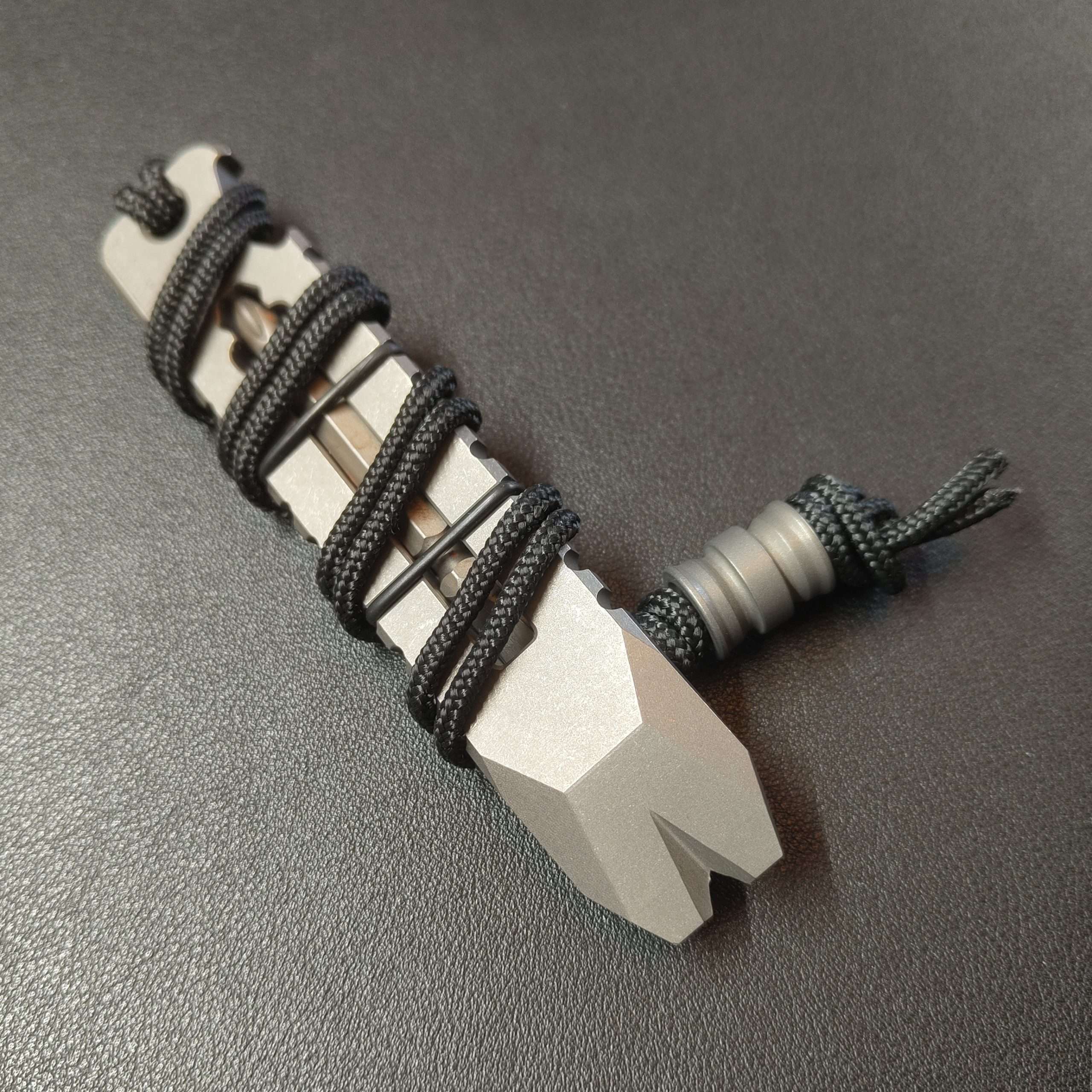 TitanClaw wrapped in lanyard with titanium bead – WGPH